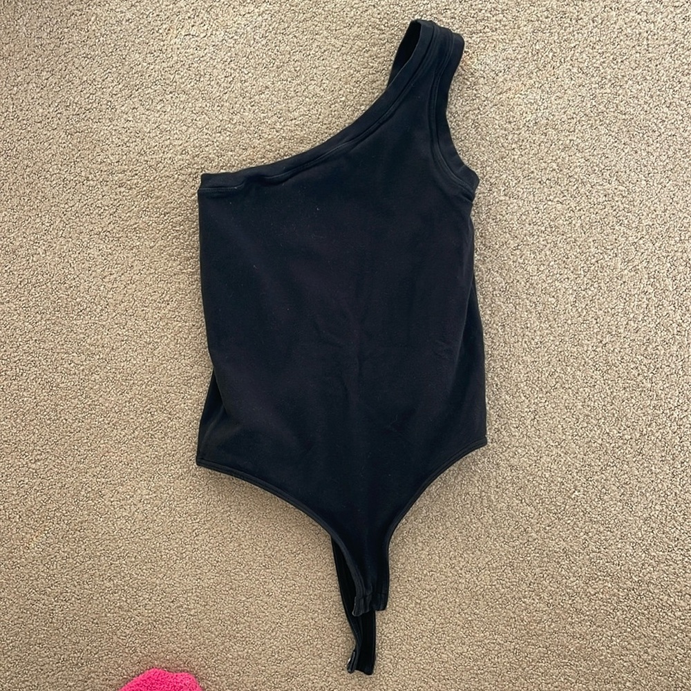 Small clyque black body suit! 92% cotton/8% spandex. Super comfortable to wear!